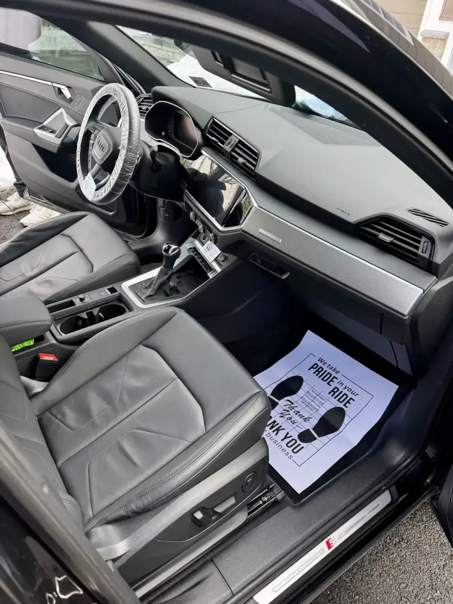 Interior after detail with paper floor mat and steering wheel cover, GNG professionalism