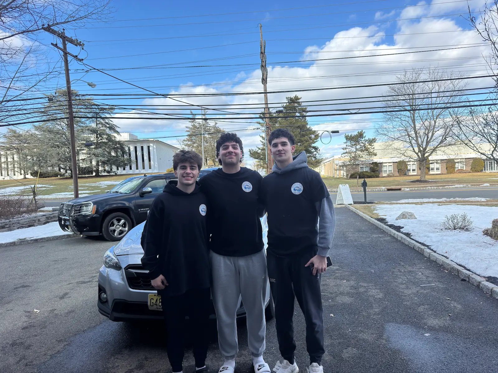 GNG Auto Detail team with customer BMW